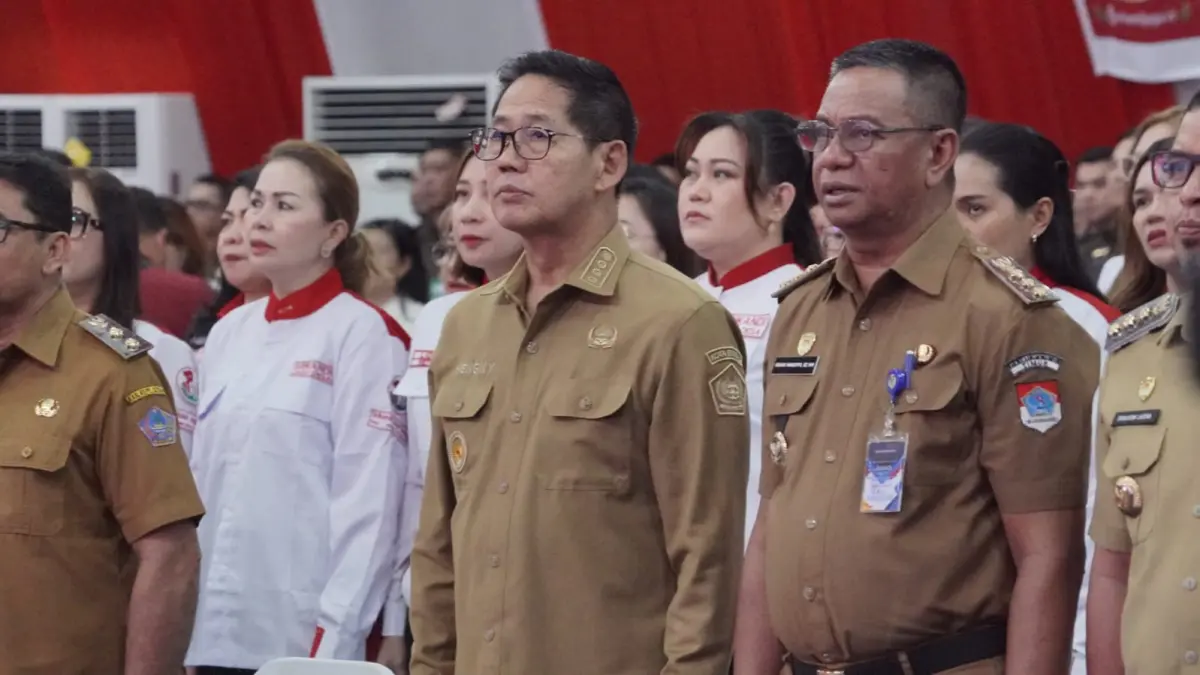 Wali Kota Bitung Hengky Honandar saat menghadiri pelantikan Srikandi Jaga Desa.(Dok Istimewa)