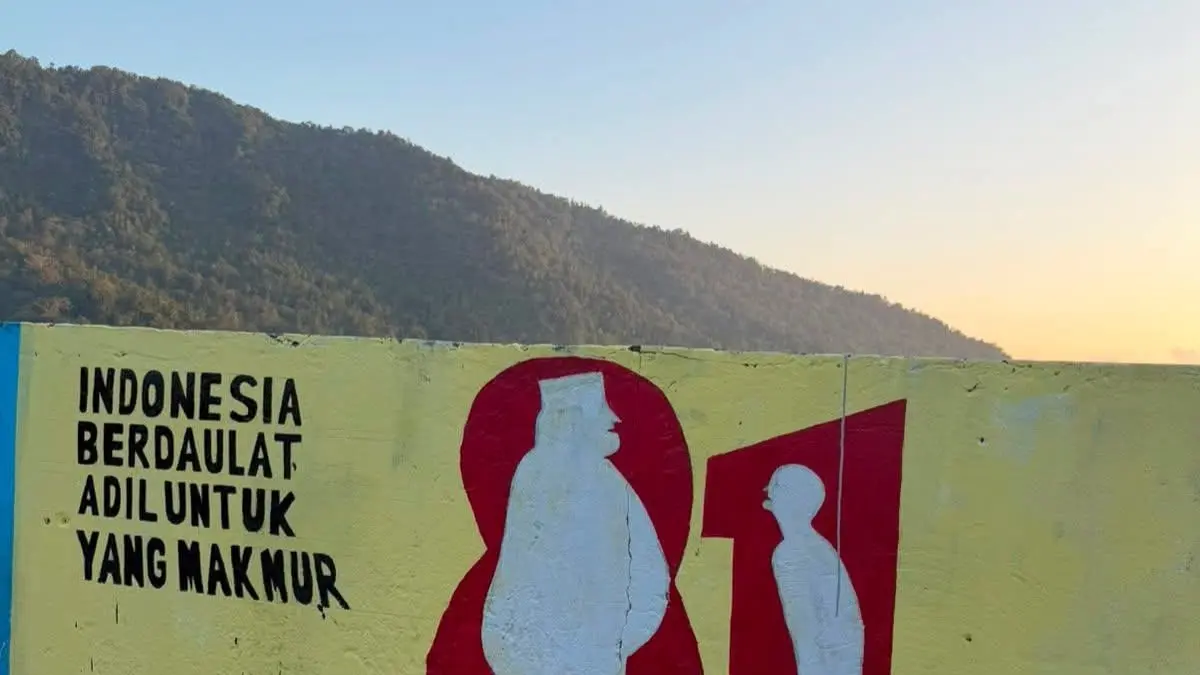 Viral Gambar Mural angka 81 dengan sosok gendut dan kurus di Boulevard Tidore, Kecamatan Tahuna Timur, Kabupaten Sangihe. Foto : Ist 