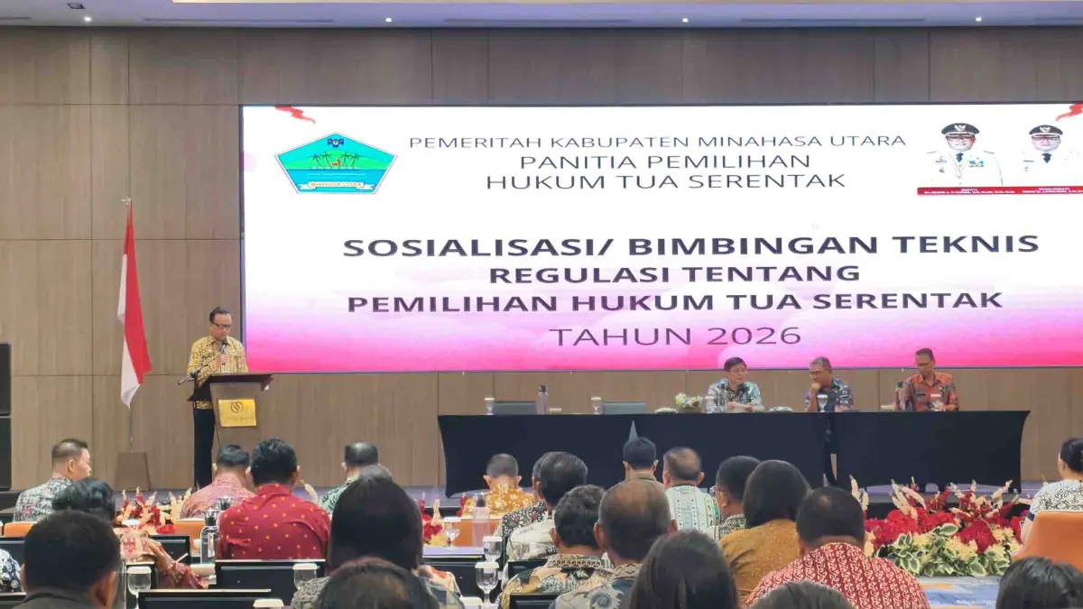 Laporan Kadis PMD Minut Jorry Tintingon dalam Bimtek regulasi tentang Pemilihan Hukum Tua Tahun 2026