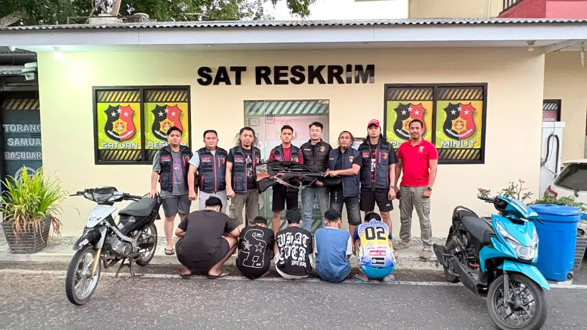 Terciduk-Personil URC Sat Reskrim Polres Minahasa Utara saat menggelandang terduga pelaku ke Mapolres Minut