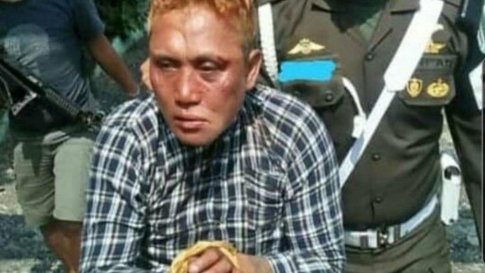 Preman kampung Dadang Buaya yang dijadikan cicak oleh petugas