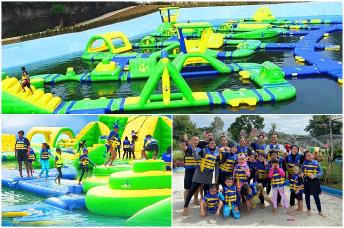 Pengunjung Bogor Aquagame tengah bermain di wahana atas air.