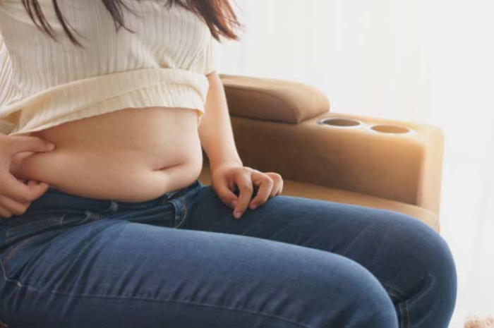 Ilustrasi perut buncit pada wanita