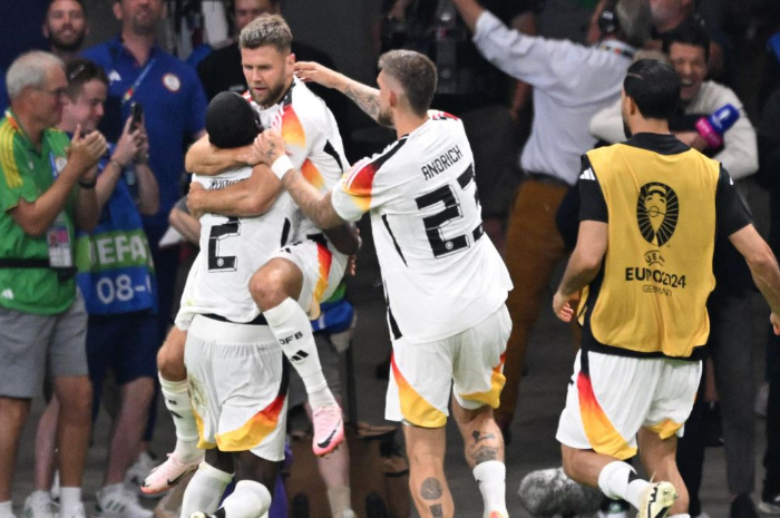 Selebrasi pemain Jerman usai menjebol gawang Swiss pada laga terakhir Grup A Euro 2024 di Deutsche Bank Park di Frankfurt, Senin (24/6/2024) dini hari WIB.