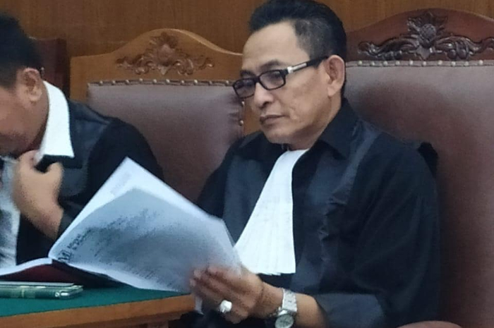 Kuasa hukum PT JJMN/Jawa Pos Group induk dari PT Duta Manuntung, Andi Syarifuddin.