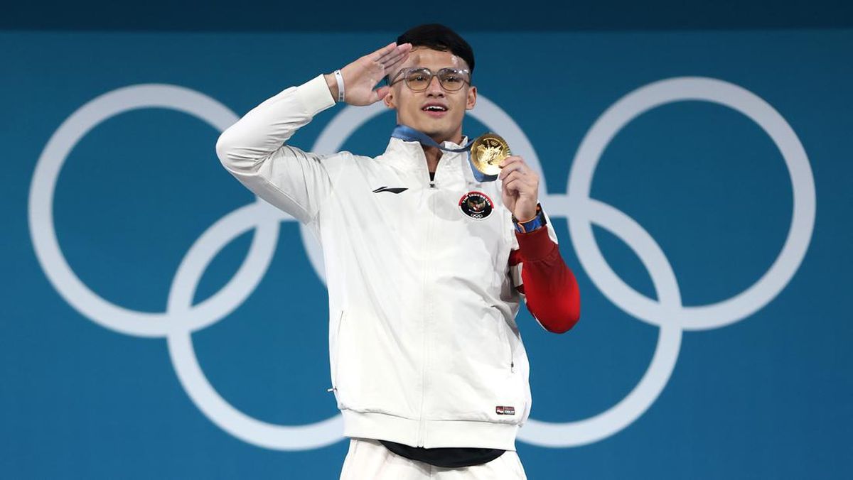 Atlet angkat besi (lifter) putra andalan Indonesia Rizki Juniansyah berhasil menyabet medali emas pada pertandingan angkat besi kelas 73 kg putra Olimpiade Paris 2024