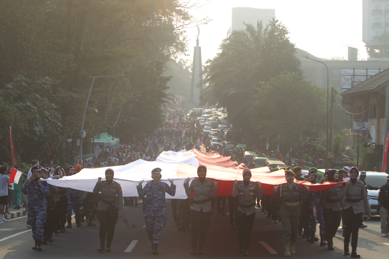 Kirab Bendera Merah Putih yang digelar Festival Merah Putih (FMP) di Kota Bogor, Minggu (18/8/2024).