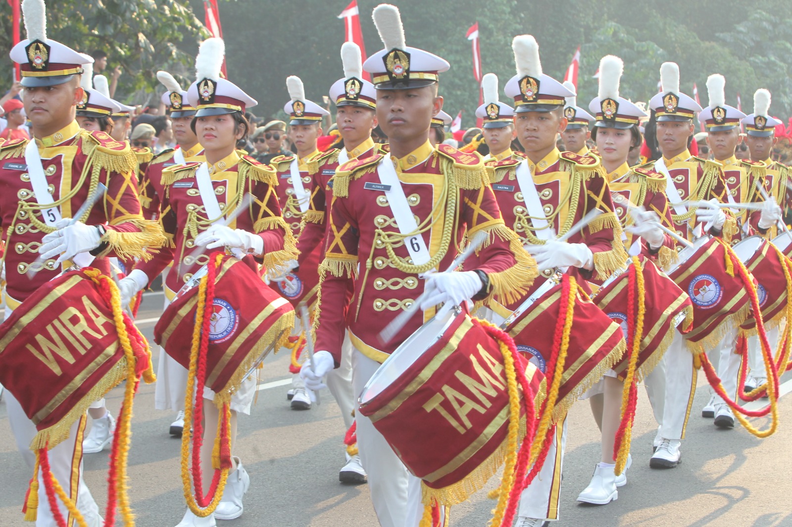 Drumband ikut terlibat dalam kegiatan Kirab Merah Putih FMP 2024 yang digelar Minggu (18/8/2024).