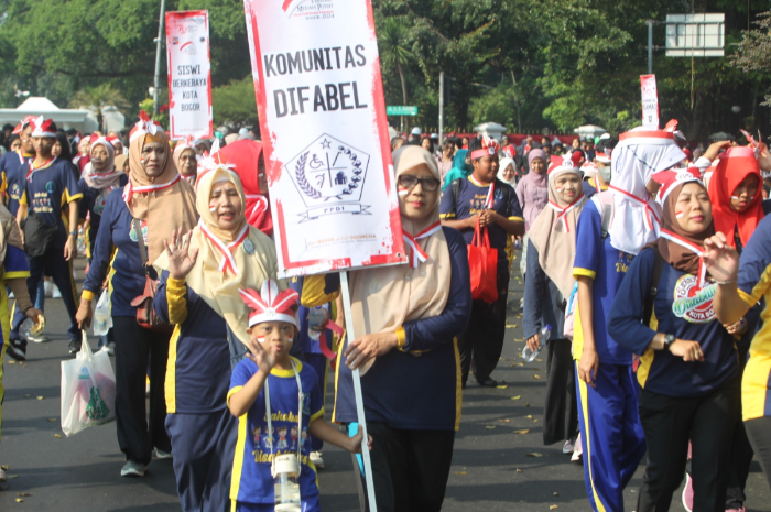 Komunitas Disabilitas Kota Bogor saat mengikuti Kirab Merah Putih 2024.
