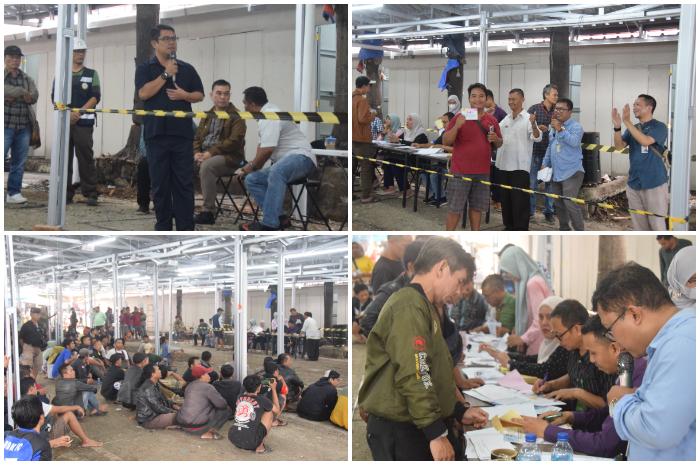Suasana pembagian TPS bagi para pedagang basah di Pasar Merdeka yang dilakukan Perumda PPJ.