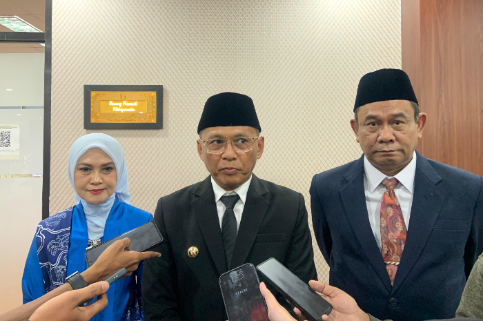 Pj Wali Kota Bogor Hery Antasari usai menghadiri pelantikan pimpinan definitif DPRD Kota Bogor di Gedung DPRD Kota Bogor pada Selasa (24/9/2024).