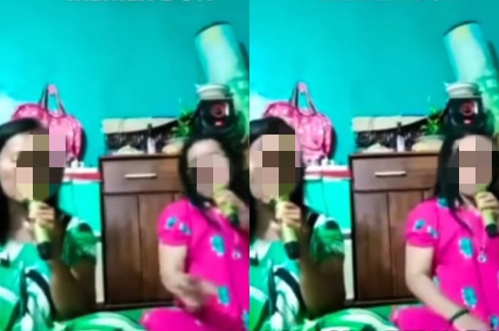 Seorang wanita (baju pink) menjadi korban saat sedang live di media sosial.