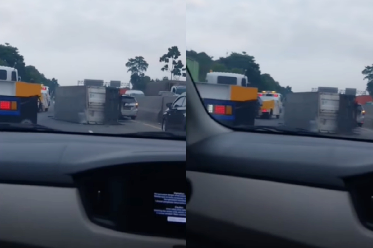 Kecelakaan truk terbalik di KM 65 Tol Jakarta-Cikampek, Sabtu (23/11/2024).