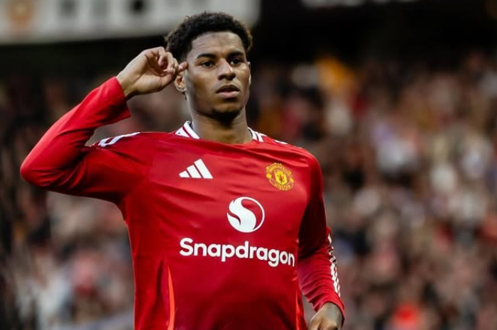 Marcus Rashford usai mencetak gol bersama Manchester United.