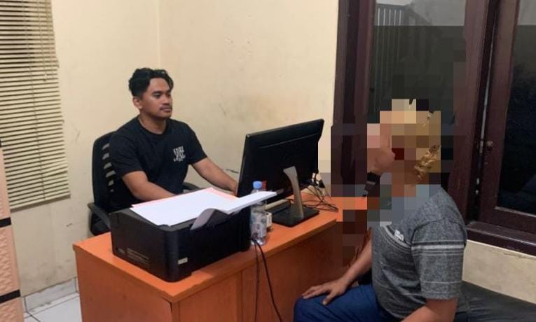 Agus, pria viral yang palak pedagang pizza gerobok di dekat IPB University Bogor.