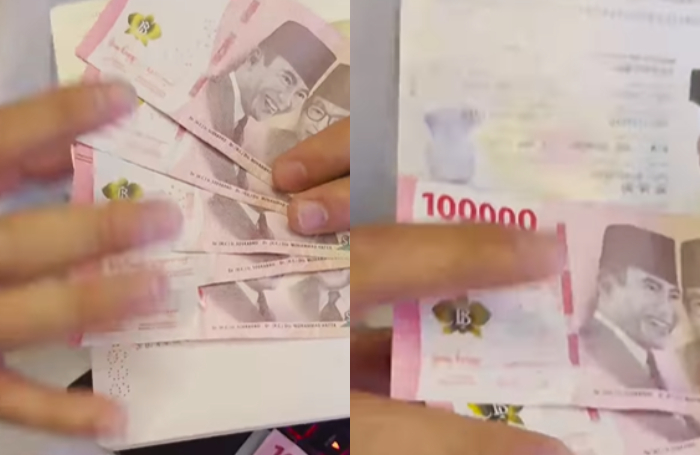 Seorang warga negara asal China memperlihatkan uang yang diselipkan di paspor saat berkunjung ke Indonesia viral di media sosial.