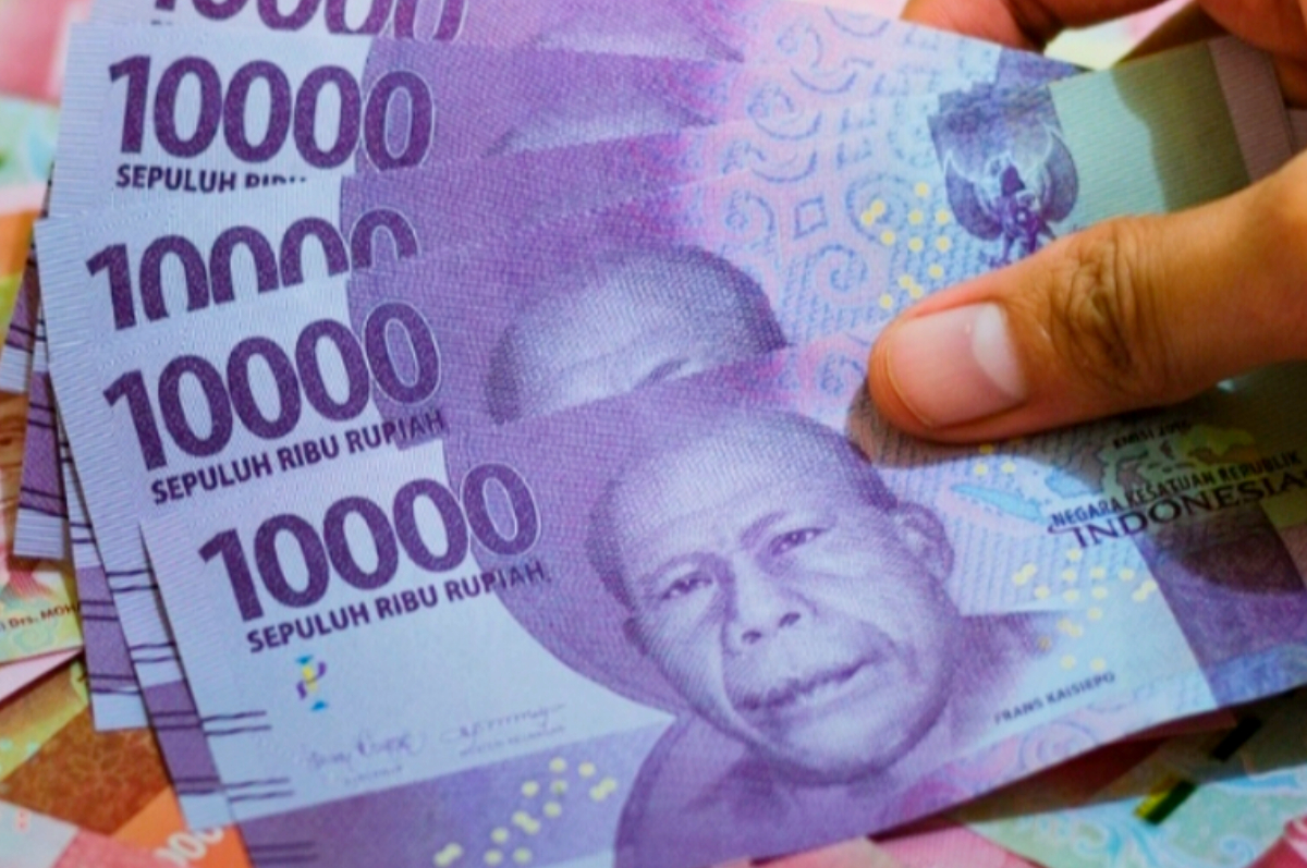 Ilustrasi uang pencairan bansos.