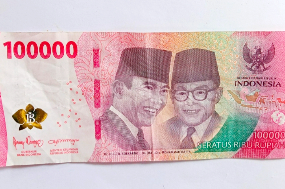 Ilustrasi uang pencairan bansos.