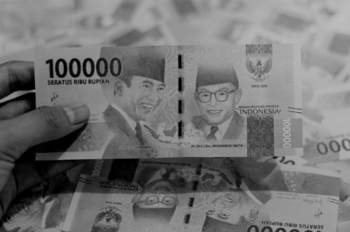 Ilustrasi uang pencairan bantuan sosial.