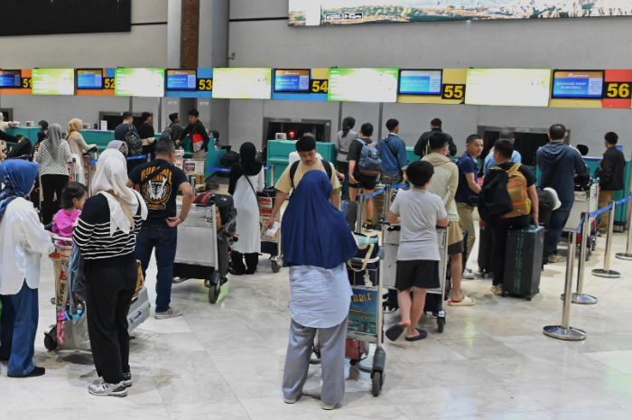 Ilustrasi suasana di bandara. Pada musim mudik 2025 pemerintah memberikan diskon tiket pesawat.