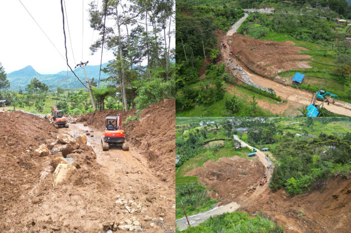 Petugas sedang membersihkan longsor yang terjadi di tanjakan 2.000, Jalur Puncak Dua, Kabupaten Bogor.