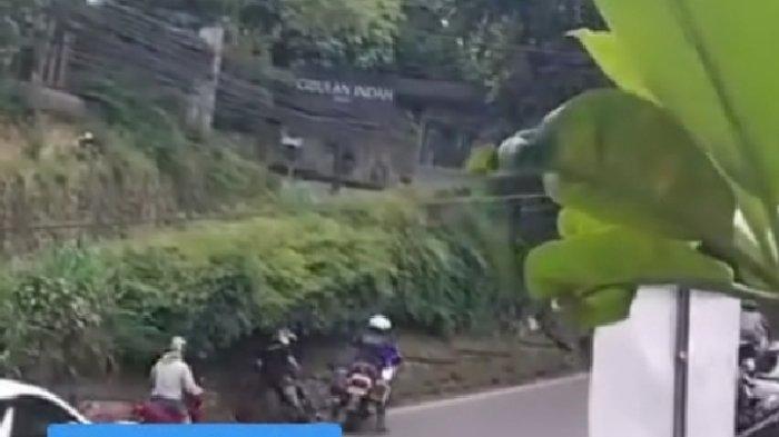 Tangkapan layar video oknum polisi patwal arogan di Kawasan Puncak Bogor.