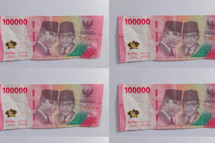 Ilustrasi uang pencairan bansos.