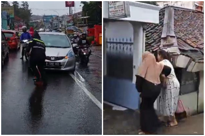 Petugas saat membantu mengawal ibu hamil menuju tempat persalinan di Jalur Puncak Bogor.