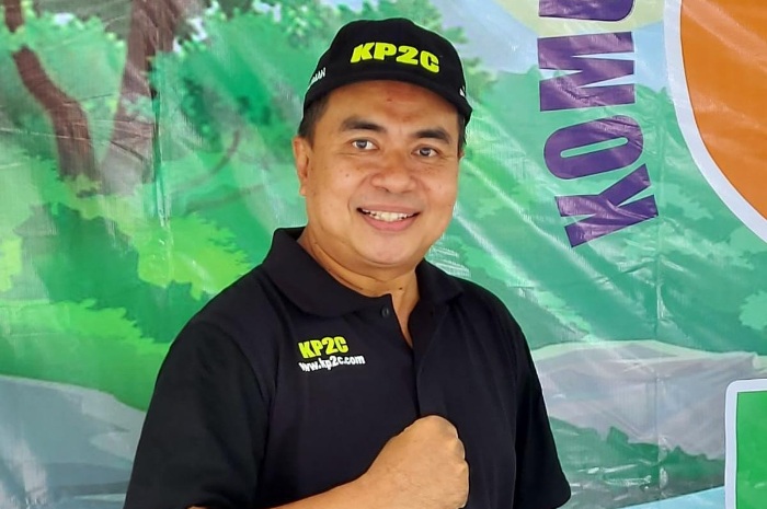 Ketua KP2C, Puarman, melaporkan penyebar hoaks Sungai Cileungsi siaga 1 ke Polres Bogor