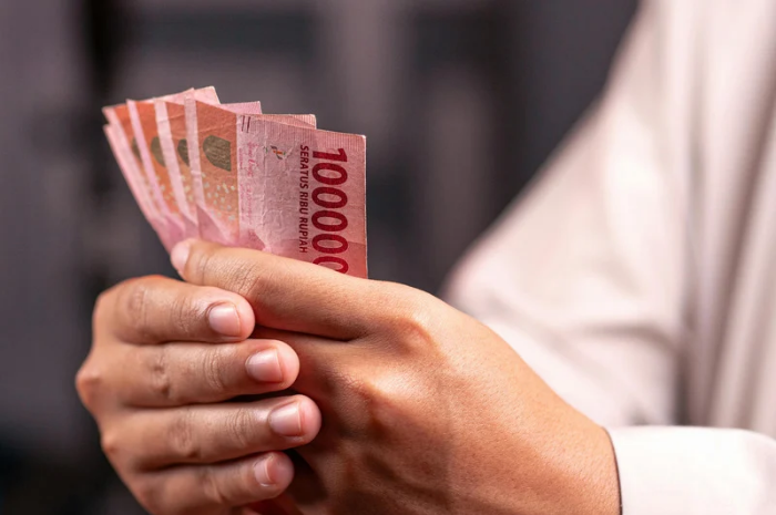 Ilustrasi uang gaji ke-13 pensiunan ASN cari mulai 2 Juni 2026
