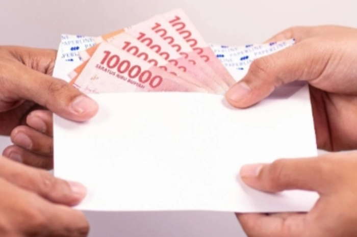 Ilustrasi uang bantuan sosial (bansos) dengan total Rp1,5 juta yang bakal cair akhir Juli 2025