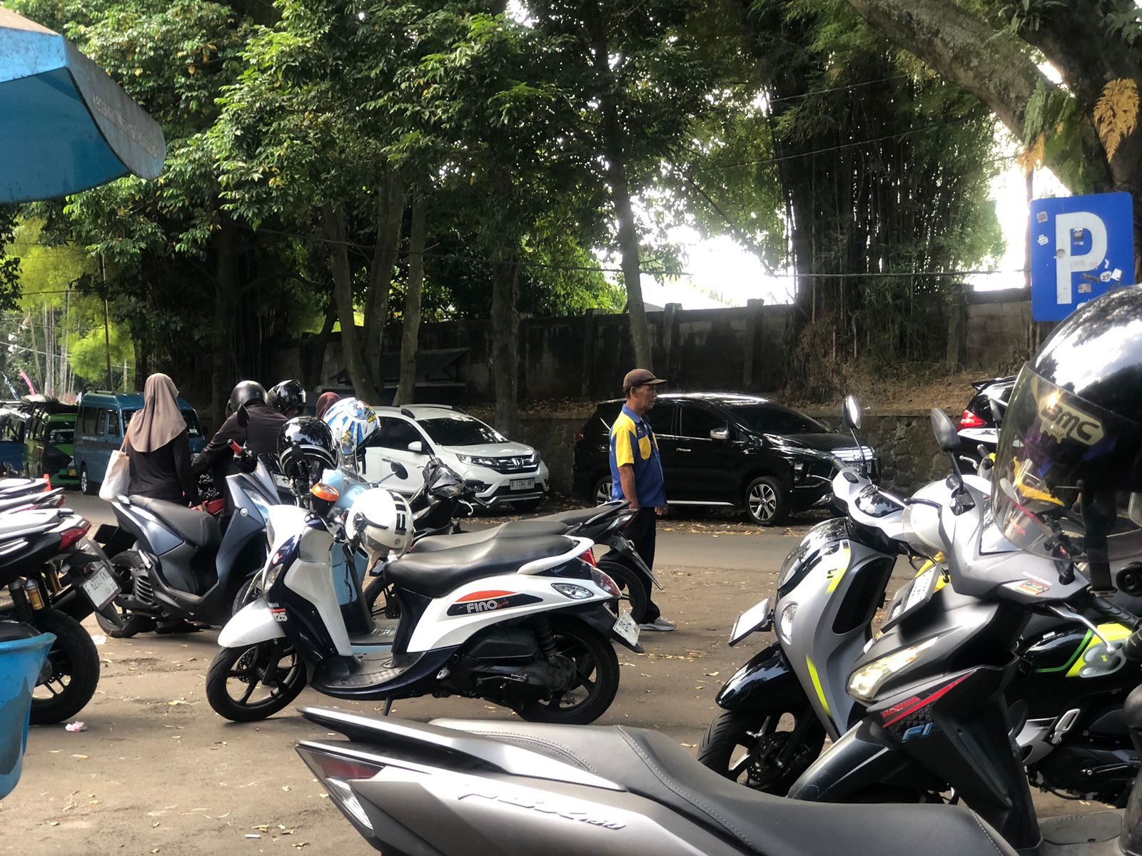 Ilustrasi Jukir yang tengah menjaga kendaraan di sejumlah titik yang ada di Kota Bogor.