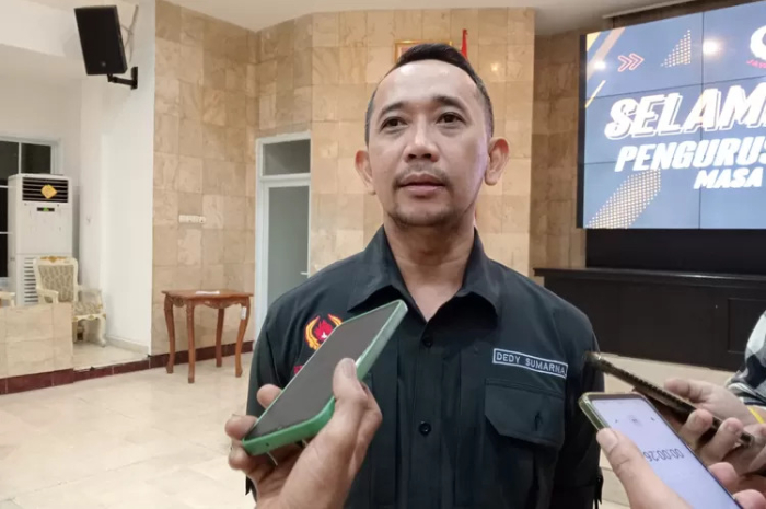 Ketua KONI Kota Bogor, Dedy Sumarna saat menyampaikan keterangan kepada wartawan.