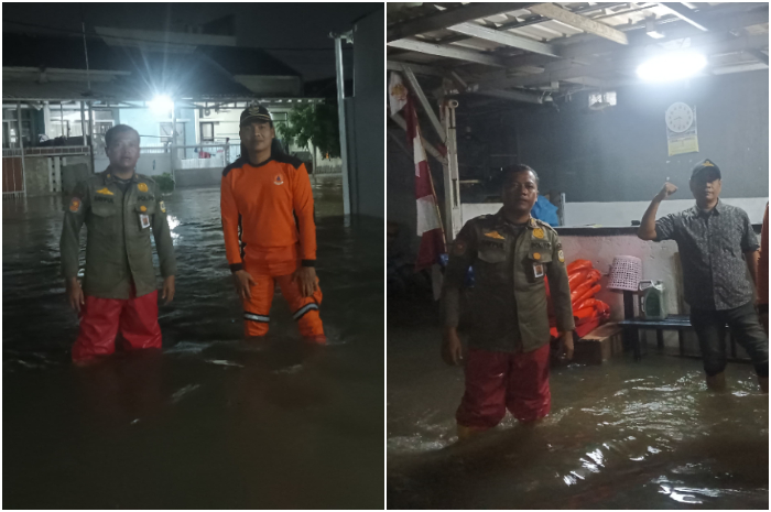 Proses evakuasi banjir di Desa Cilebut Barat, Kecamatan Sukaraja, Kabupaten Bogor.