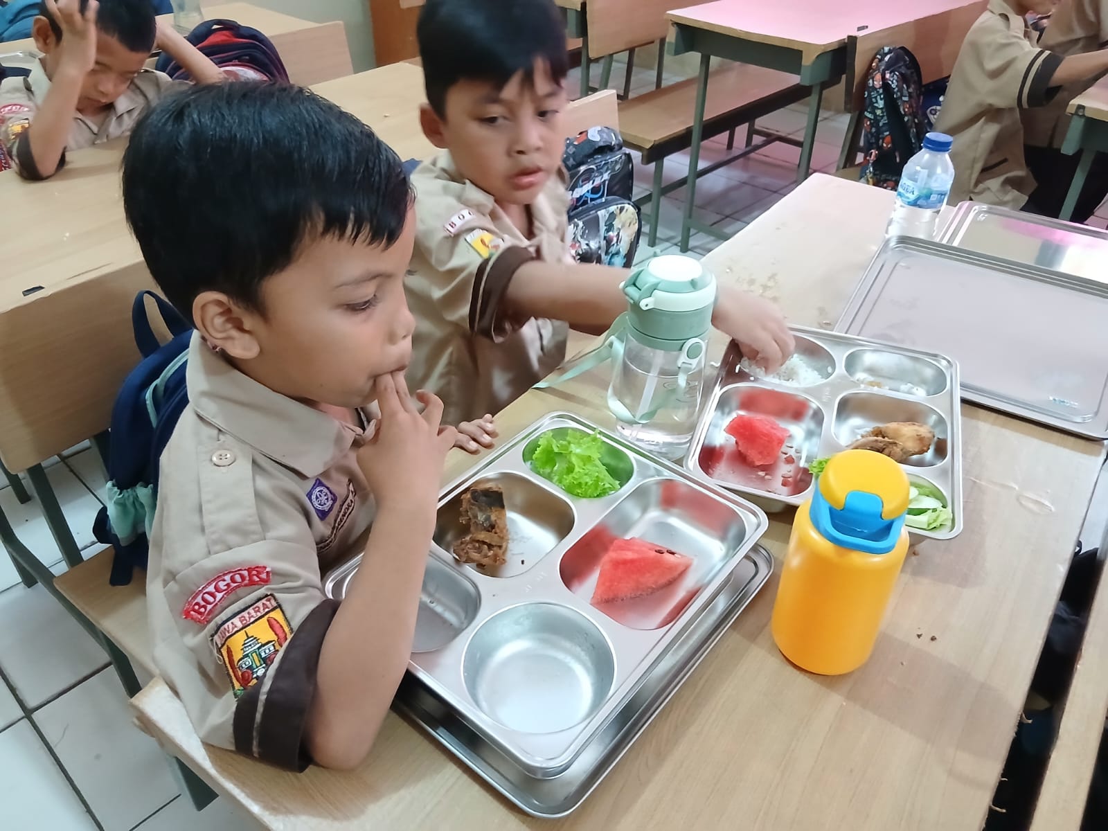 ILUSTRASI: Siswa SDN Baranangsiang, Kota Bogor, saat menikmati program Makan Bergizi Gratis (MBG).