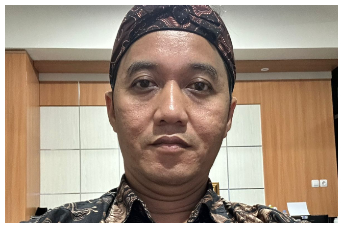 Kepala TU MAN 1 Bogor, Rahmatullah.