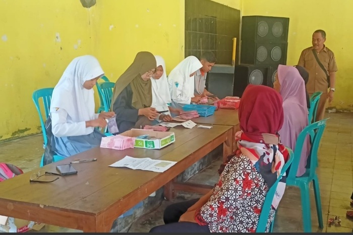 Penyaluran bansos PKH dan BPNT  Rp1,5 juta ke warga