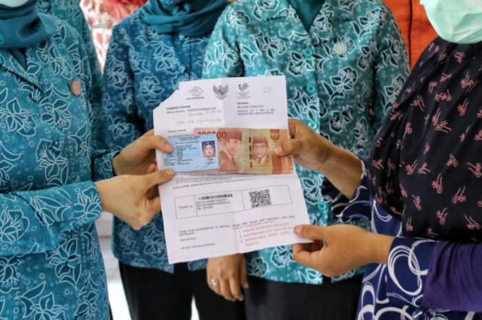 Ilustrasi: Penyaluran bantuan sosial (bansos).&nbsp;