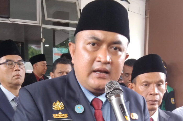 Bupati Bogor Rudy Susmanto saat menyampaikan keterangan.