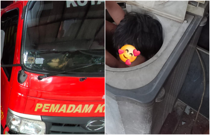 Petugas Damkar Kota Depok membantu seorang anak yang masuk ke mesin cuci.