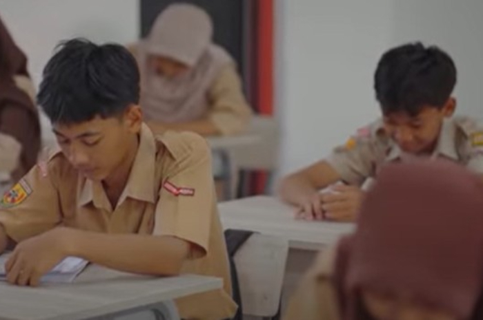 Ilustrasi: Kegiatan belajar mengajar siswa di kelas.