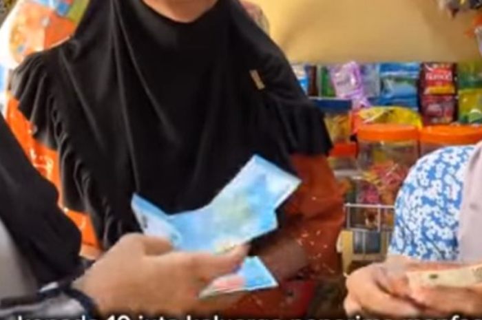 Ilustrasi penarikan dana bansos oleh KPM