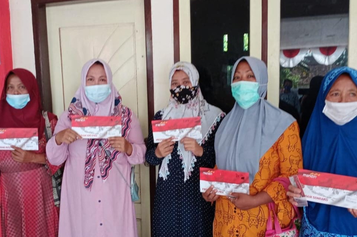 ILUSTRASI. KPM bansos PKH BPNT terima KKS.