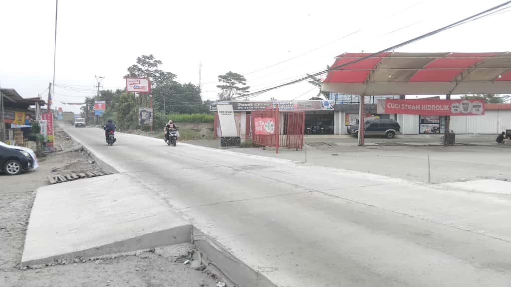 Kondisi terbaru Jalan Cileungsi&ndash;Setu, Kecamatan Cileungsi, Kabupaten Bogor, yang telah selesai diperbaiki, Senin 13 Oktober 2025.