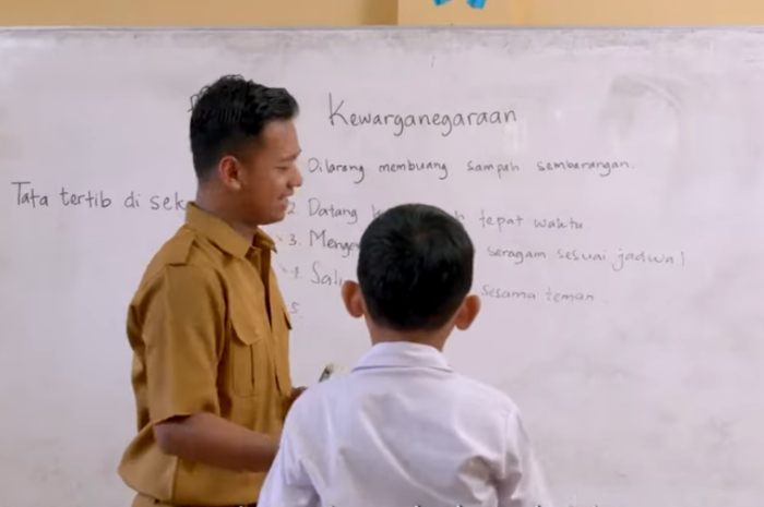 Ilustrasi guru yang sedang mengajar di kelas