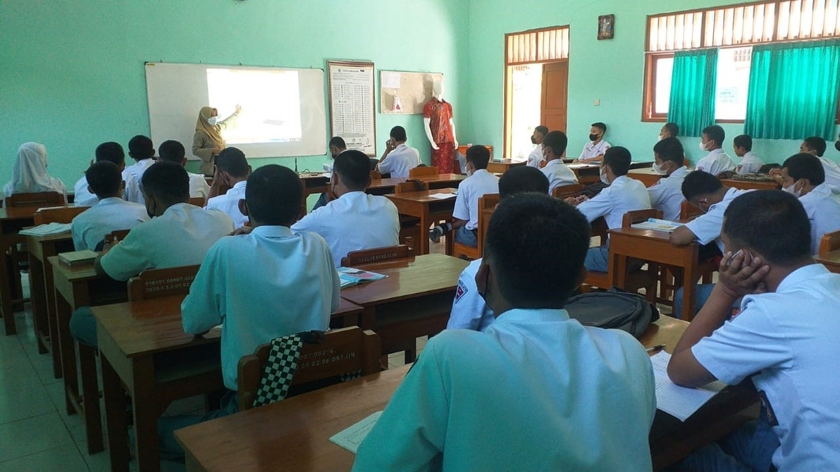 Ilustrasi guru mengajar di kelas