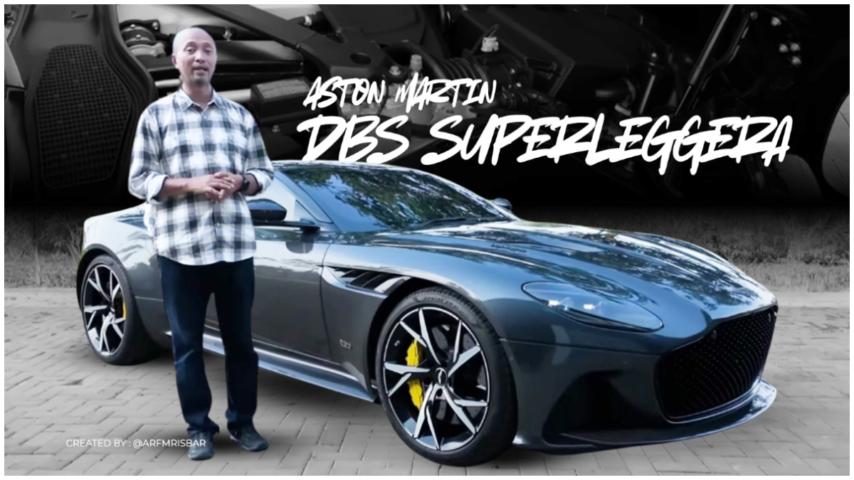 Content creator otomotif Fitra Eri saat mengulas mobil&nbsp;Aston Martin DBS Superleggera.