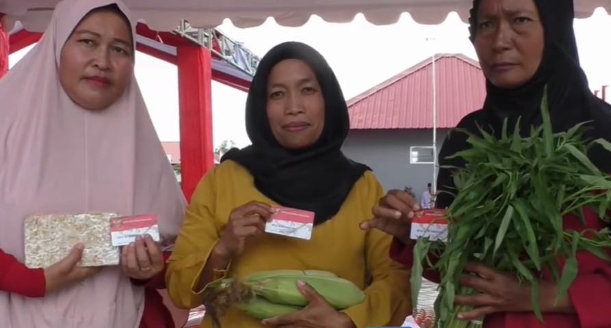 Ilustrasi KPM Peralihan KKS Baru saat menerima pencairan Bansos reguler