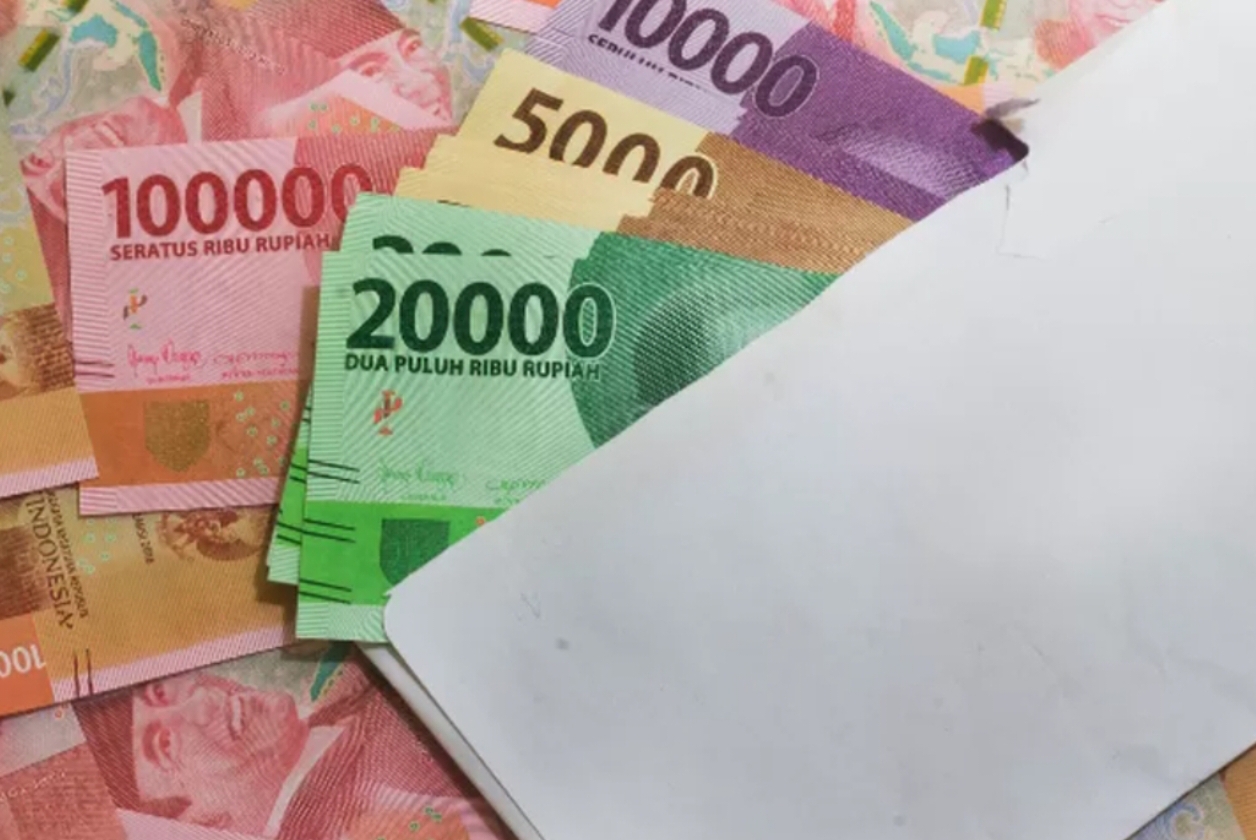 Ilustrasi uang pencairan bansos PKH BPNT yang dicairkan oleh KPM.