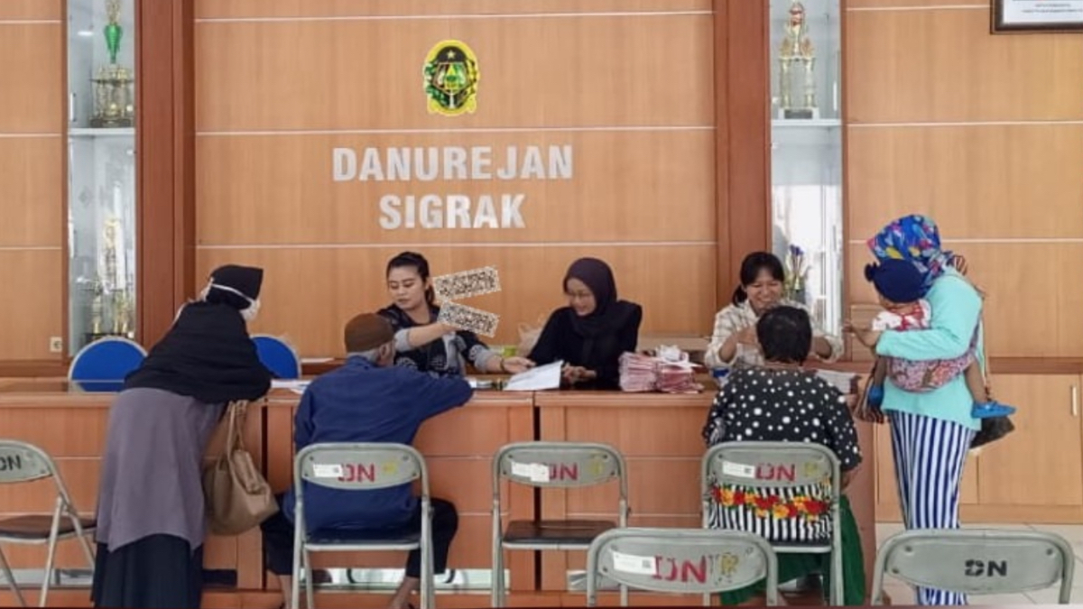 Ilustrasi suasana penyaluran bansos PKH BPNT.